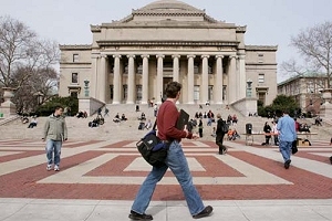 In the photo, Low Memorial Library fronts an expansive plaza, a popular gathering place for Columbia’s students. (© AP Images)